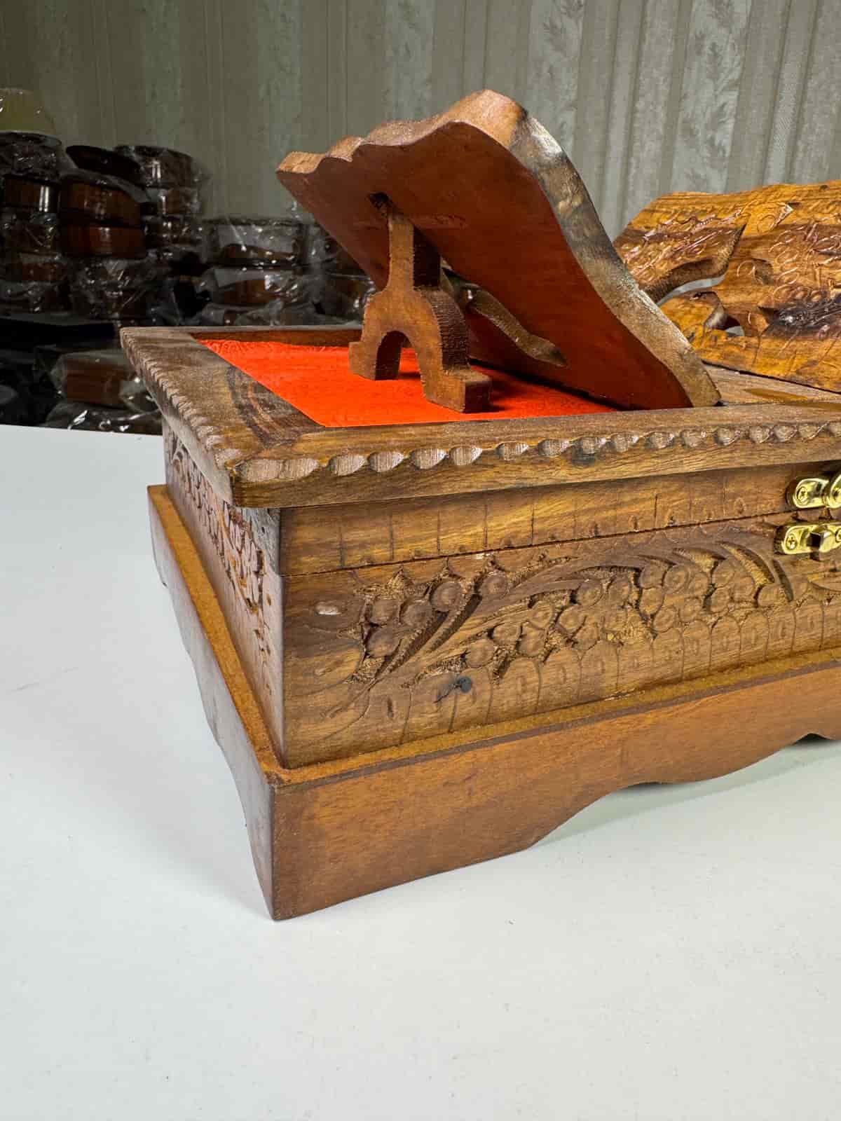 Hand-carved wooden Quran box with Islamic calligraphy and floral motifs